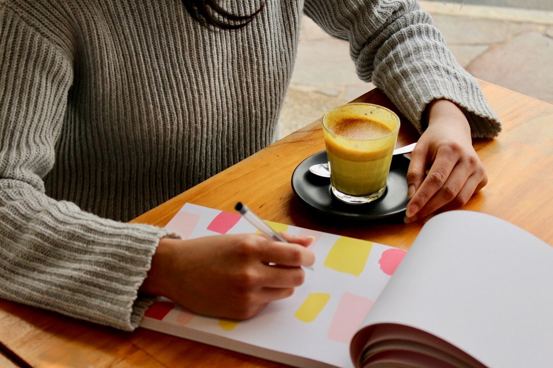 person setting goals on paper